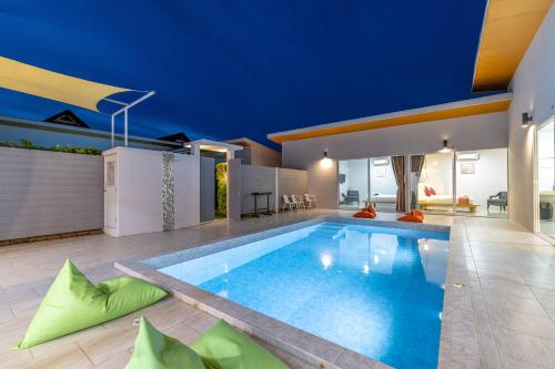 a swimming pool in the middle of a house at Andaman Sea Best Pool Access and Villas in Phuket Town
