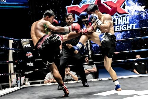 a group of people in a boxing match at Andaman Sea Best Pool Access and Villas in Phuket Town