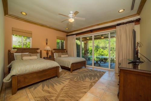 Katil atau katil-katil dalam bilik di Casa Oasis 5 bdrs private pool in Los Suenos