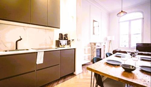 Η κουζίνα ή μικρή κουζίνα στο Bogota - Charme central à Reims - 6P