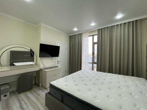 Llit o llits en una habitació de Kungey Foothills
