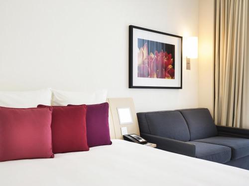 En eller flere senge i et værelse på Novotel Abu Dhabi Al Bustan
