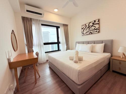 Ένα ή περισσότερα κρεβάτια σε δωμάτιο στο Agile Bukit Bintang By AR