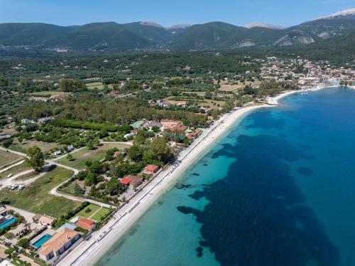 an aerial view of a beach and the ocean at Endless Blue House in Sami