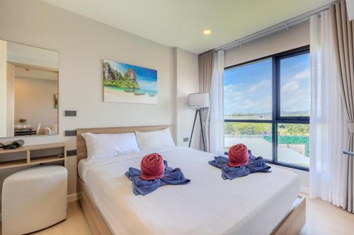 Katil atau katil-katil dalam bilik di Space 404 - 1BDR with Coworking, Pool & Gym Access