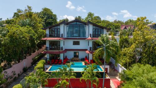 an aerial view of a house with a swimming pool at Paradise Island Estate in Choeng Mon Beach