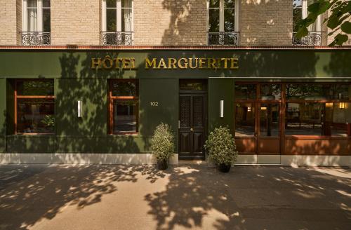 a store front of a marriott at Hôtel Marguerite in Paris