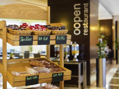 a display of pastries on display in a bakery at ibis Muscat in Muscat