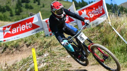 a person riding a bike on a dirt track at Shackleton Chalet in Sestriere