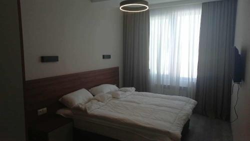 Una cama o camas en una habitación de Crystal Loft A409
