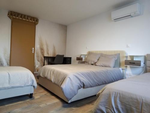 Ένα ή περισσότερα κρεβάτια σε δωμάτιο στο Appartement cosy 6 pers 2 chambres