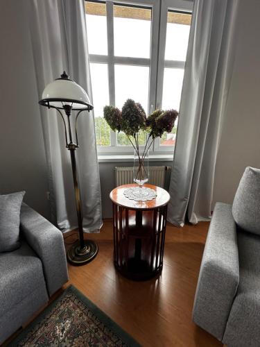 Ein Sitzbereich in der Unterkunft apartament Mysłowice