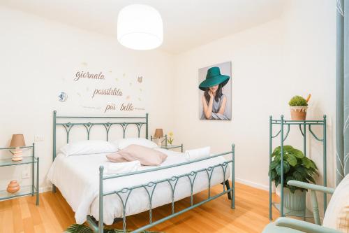 Postel nebo postele na pokoji v ubytování ISEO LAKE 3-Bedroom just 40 meters from the lake and 12 meters from Piazza Garibaldi