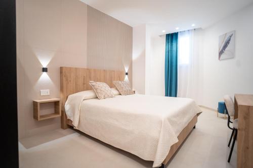 Ένα ή περισσότερα κρεβάτια σε δωμάτιο στο B&B Villa M S
