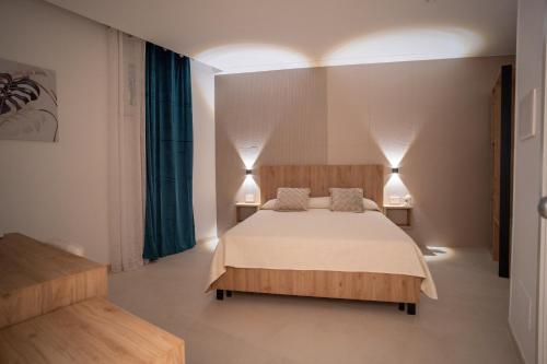 Ένα ή περισσότερα κρεβάτια σε δωμάτιο στο B&B Villa M S