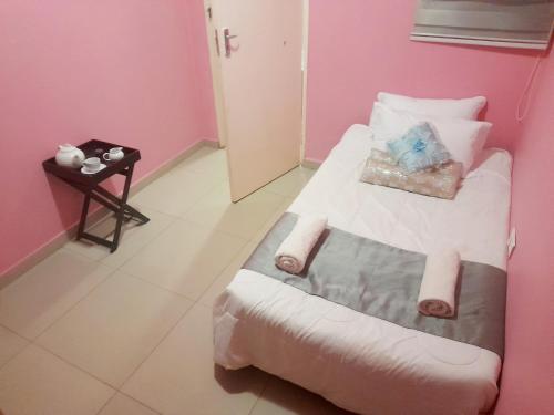 Ένα ή περισσότερα κρεβάτια σε δωμάτιο στο Mercy Retreat Vacation Home