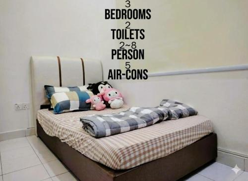 a bed with bedrooms toilets and a person art towns at HomeStay Sungai Petani Kedah in Sungai Petani