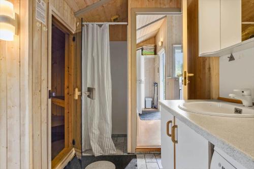 a bathroom with a shower and a sink at FY394-Asperup-Kildevangsvej-19 in Asperup