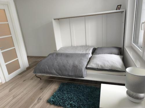 Katil atau katil-katil dalam bilik di Moderne 2-Zimmer-Ferienwohnung in zentraler, ruhiger Lage