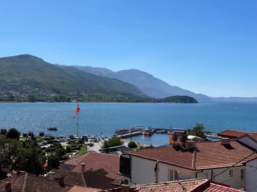 a view of a large body of water with mountains at Villa Stefanija in Ohrid