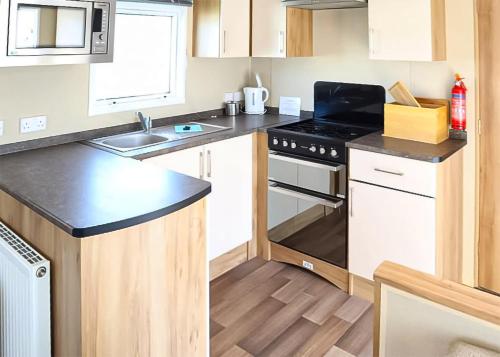 Dapur atau dapur kecil di Merryfield And Sandfield