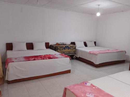 Postel nebo postele na pokoji v ubytování Ella Nature Park Resort