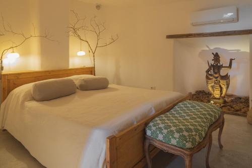 Una cama o camas en una habitación de Alchimia Verde Herbaria