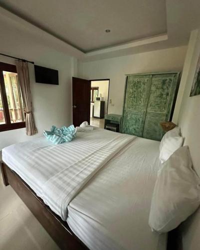 Ένα ή περισσότερα κρεβάτια σε δωμάτιο στο The Hideout Samui
