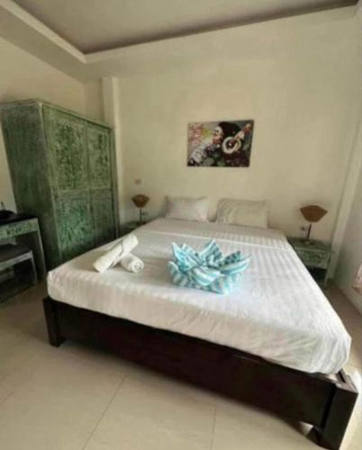 Ένα ή περισσότερα κρεβάτια σε δωμάτιο στο The Hideout Samui