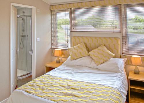 Katil atau katil-katil dalam bilik di Wigmore Lakes Lodges