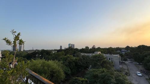 a view of a city with trees and buildings at TAJ Executive Hotel F7 Islamabad in Islamabad