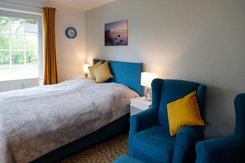 Giường trong phòng chung tại App 7 Granitzblick, Seedorf