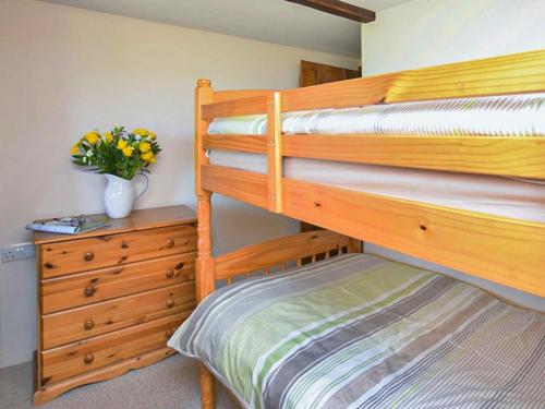 Postel nebo postele na pokoji v ubytování Miller's Cottage -Uk48595