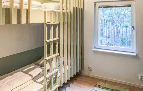 Gorgeous Home In Vikbolandet With Wifiにあるベッド