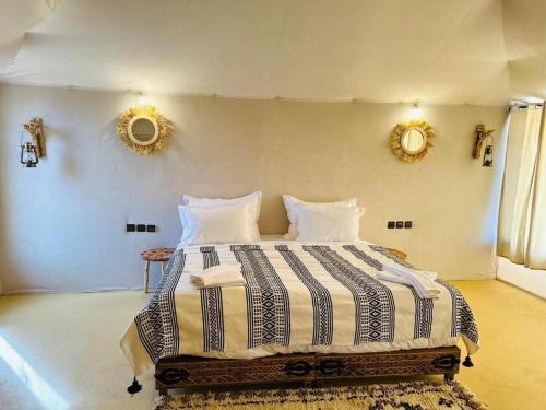Ein Bett oder Betten in einem Zimmer der Unterkunft Laman Luxury Camp