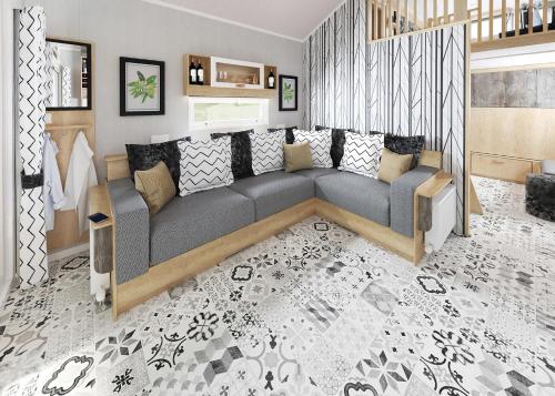 a living room with a couch in a room at Springhouse Country Park in Slaley