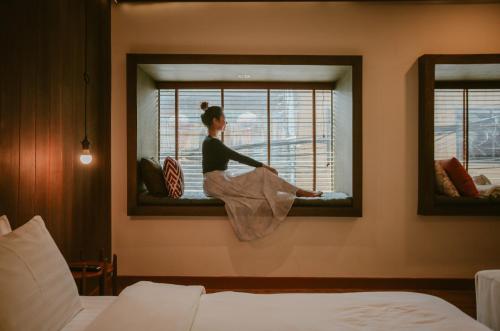 Katil atau katil-katil dalam bilik di The Folkster House Chiangkhan