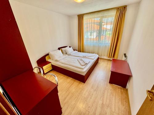 Postel nebo postele na pokoji v ubytování Todorini Kuli Apartments