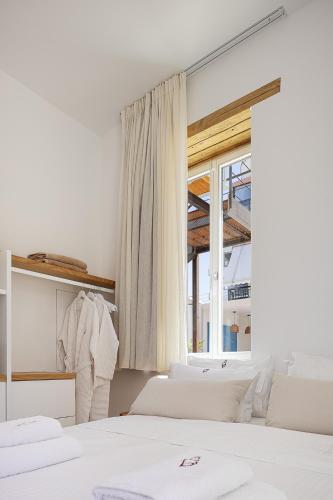 Letto o letti in una camera di Hub Hospitality