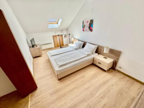 Postel nebo postele na pokoji v ubytování Todorini Kuli Apartments