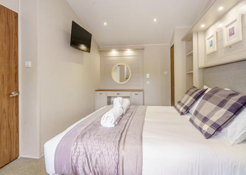 Katil atau katil-katil dalam bilik di Calthwaite Hall Lodges