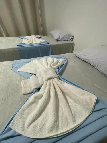 Postel nebo postele na pokoji v ubytování Ap 02 quartos um suíte