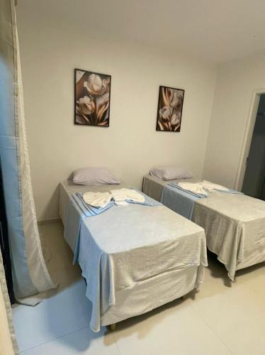 Postel nebo postele na pokoji v ubytování Ap 02 quartos um suíte
