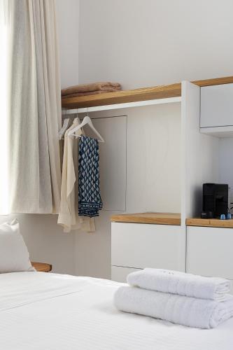 Letto o letti in una camera di Hub Hospitality