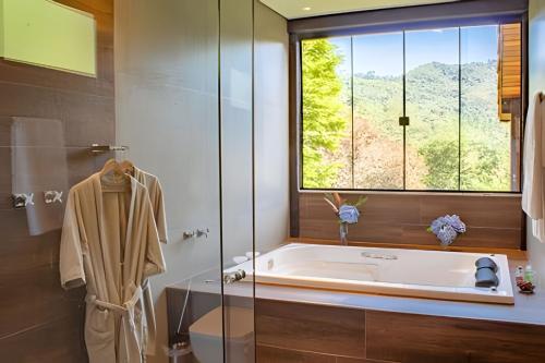 Et badeværelse på Chalé Lua Nova - Cabanas Lua Nova