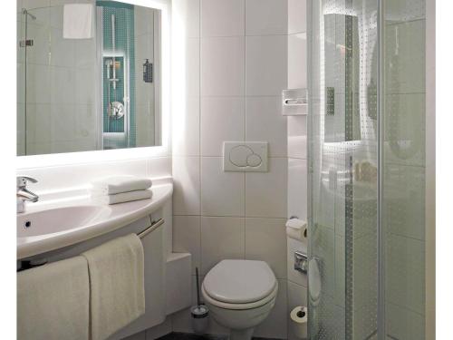 Ein Badezimmer in der Unterkunft ibis Locarno