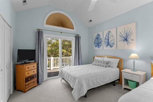 Ένα ή περισσότερα κρεβάτια σε δωμάτιο στο Eyes of the Ocean - Peaceful Beach Retreat!