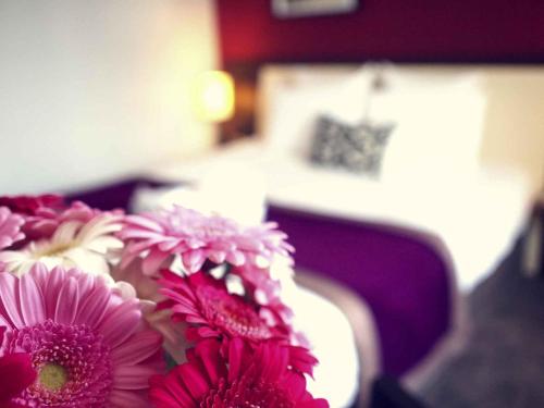 Katil atau katil-katil dalam bilik di Mercure Angers Centre Gare