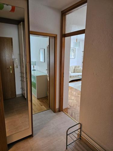a room with a door open to a bedroom at MiA in Tomislavgrad