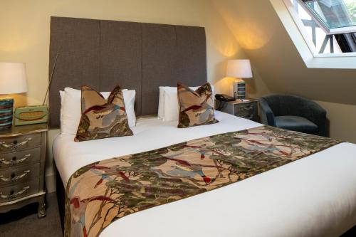 Katil atau katil-katil dalam bilik di Forest Park Country Hotel & Inn, Brockenhurst, New Forest, Hampshire - The Coaching Inn Group